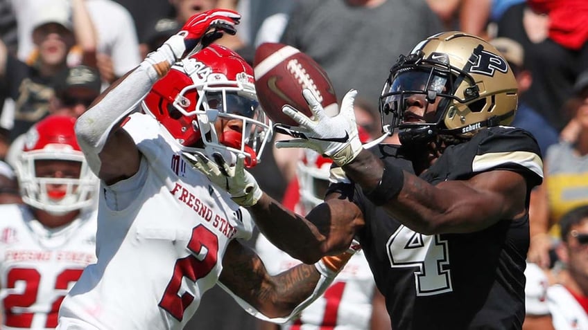 purdues deion burks bounces off fresno state defenders breaks loose for an incredible touchdown