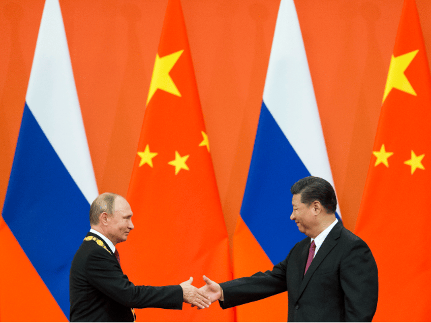 putin aide says russian leader will visit china for belt and road forum in october