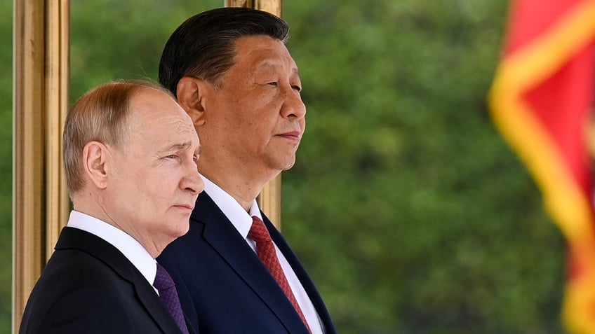 Chinese President Xi Jinping, right, and Russian President Vladimir Putin