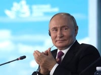 Putin backs Harris for US president, with wry smile