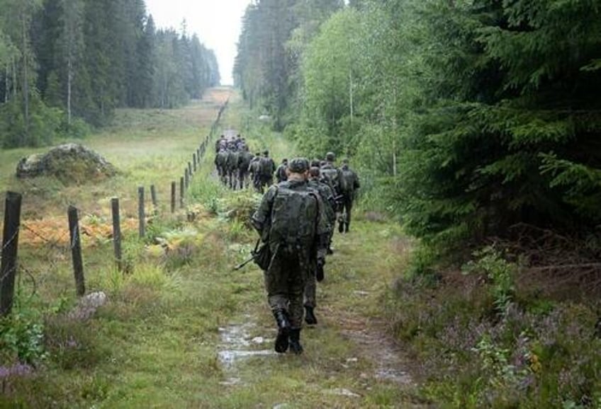 putin deploys troops along finland border in response to nato accession