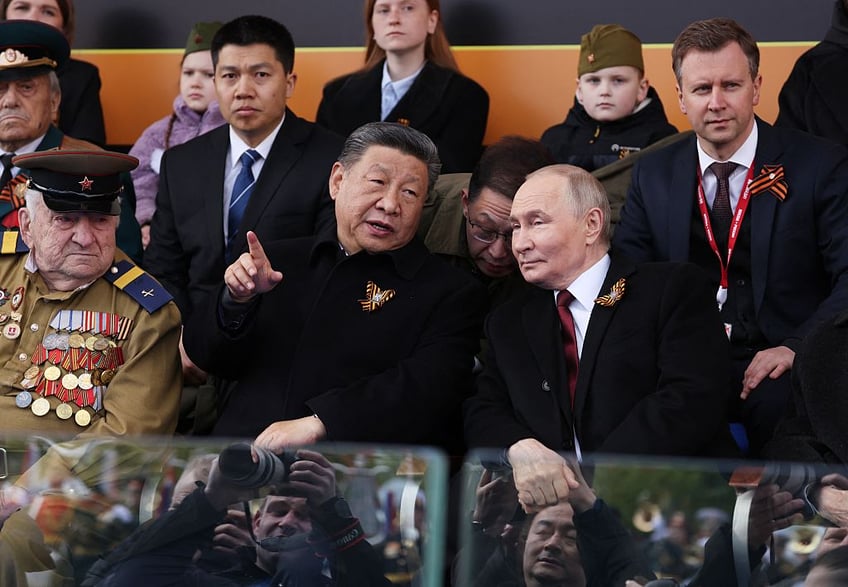 putin puts on larger display of military troops tanks in red square victory day parade