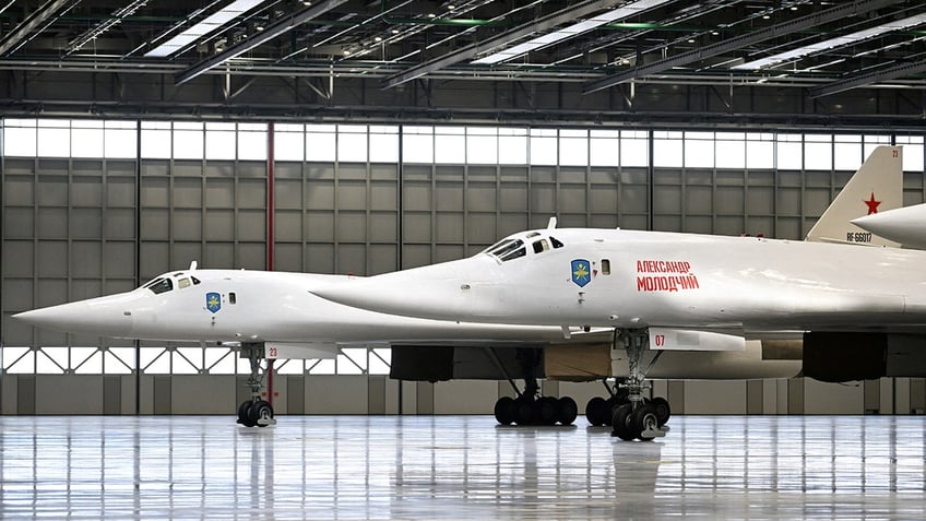 Two bombers in a hangar