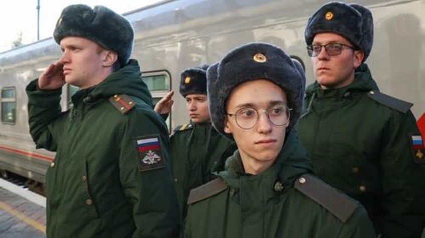 putin signs decree to draft 130k young men in fall conscription