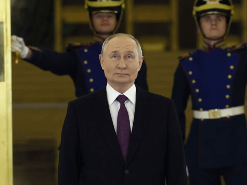 Russian President Vladimir Putin attends a ceremony to receive credentials from newly arri