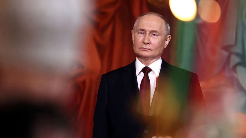 Russian President Vladimir Putin attends the Orthodox Easter service at the Cathedral of Christ the Savior in Moscow