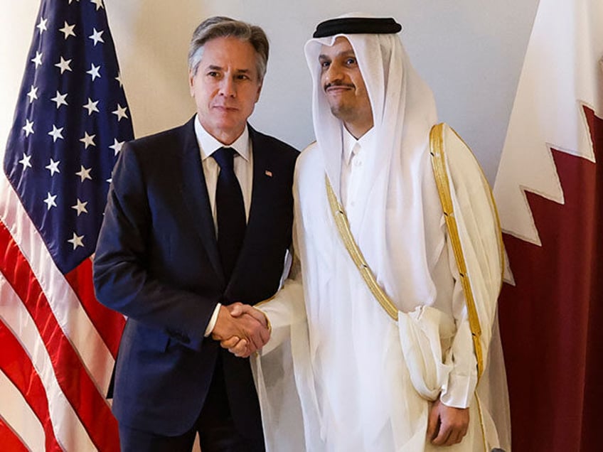 U.S. Secretary of State Antony Blinken, left, meets with Qatari Prime Minister and Minister of Foreign Affairs Sheikh Mohammed bin Abdulrahman bin Jassim Al-Thani at a hotel during a day of meetings, amid the ongoing conflict between Israel and Hamas, in Amman, Jordan, Saturday, Nov. 4, 2023.(Jonathan Ernst/Pool Photo via …