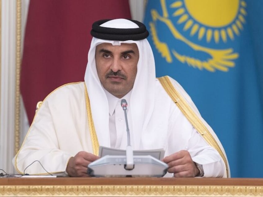 Qatari Emir Sheikh Tamim bin Hamad Al-Thani and Kazakh President Kassym-Jomart Tokayev (not seen) hold a joint press conference following their meeting at the Ak Orda Presidential Palace in Nur Sultan, Kazakhstan on October 12, 2022. (Photo by Qatari Emirate Council / Handout/Anadolu Agency via Getty Images)