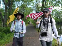 Quakers march against Trump’s crackdown on immigrants carrying on their long faith tradition