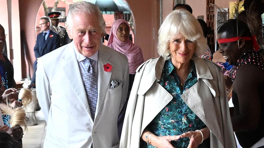 queen camilla gives king charles a love tap during kenya state visit