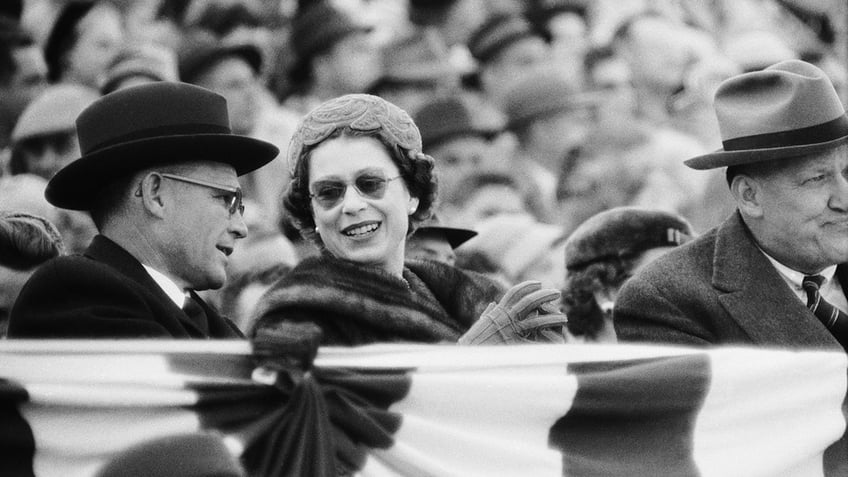 Queen Elizabeth II watching the game from the stands