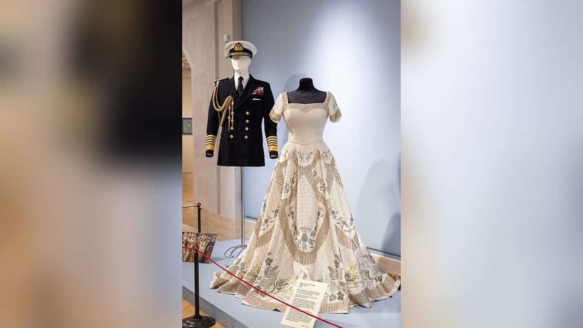 queen elizabeth is only surviving dress is on display in london plus other royal attire and treasures