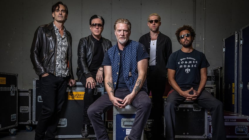 Dean Fertita, Troy Van Leeuwen, Josh Homme, Michael Shuman and Jon Theodore of Queens of the Stone Age