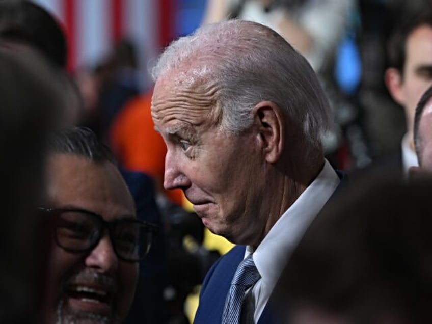 LAS VEGAS, NEVADA - DECEMBER 8: U.S. President Biden greets workers during his remarks on how his Investing in America Agenda is advancing his vision for world-class infrastructure across the country at the Carpenters International Training Center in Las Vegas, Nevada, United States on December 8, 2023. (Photo by Tayfun …