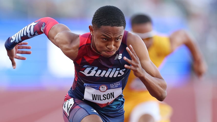 Quincy Wilson runs on track