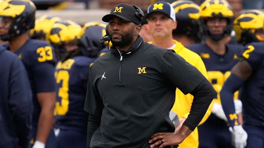 Michigan head coach Sherrone Moore watches against Texas in the second half in Ann Arbor, Mich., Saturday, Sept. 7, 2024.