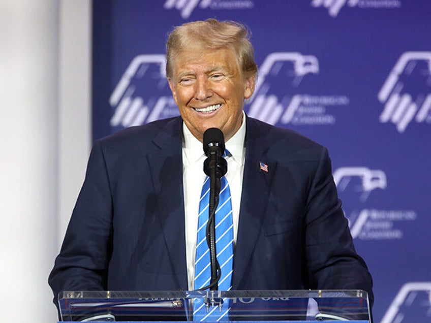 Former President of the United States Donald Trump speaking with attendees at the Republic