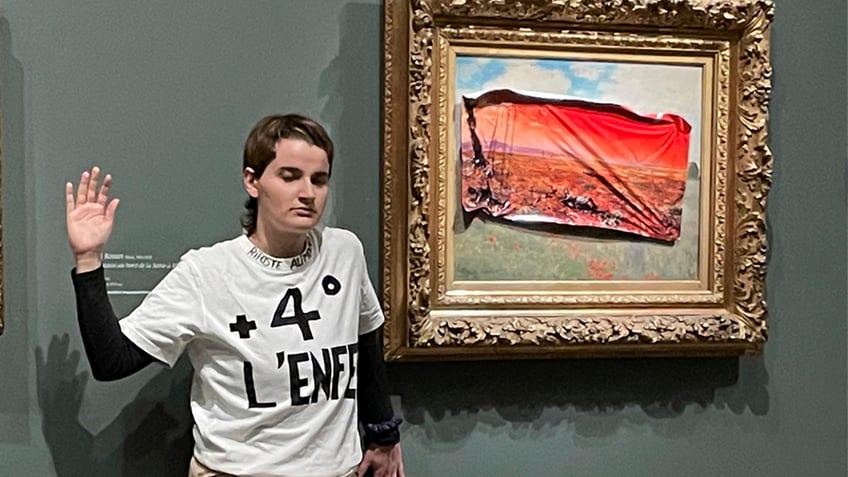 radical climate activist vandalizes famous painting in paris