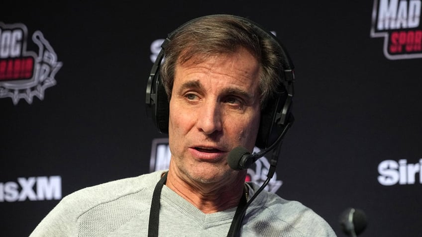 Chris Russo on his radio set