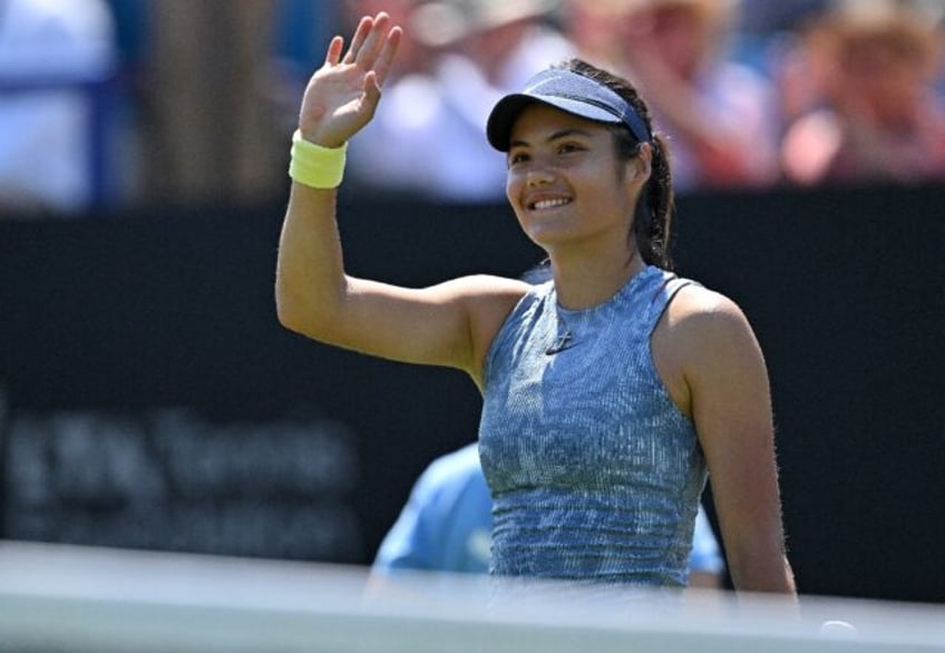 Britain's Emma Raducanu celebrates victory against Sloane Stephens at the Eastbourne Inter