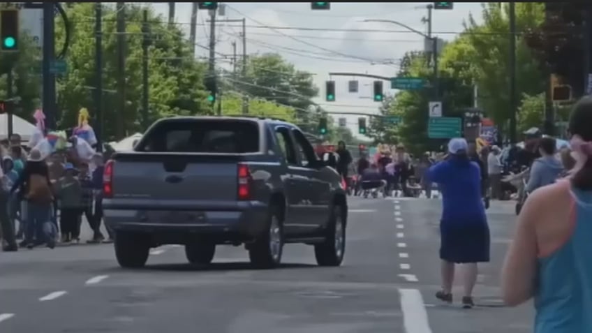 raging portland driver rips through rose parade in furious video