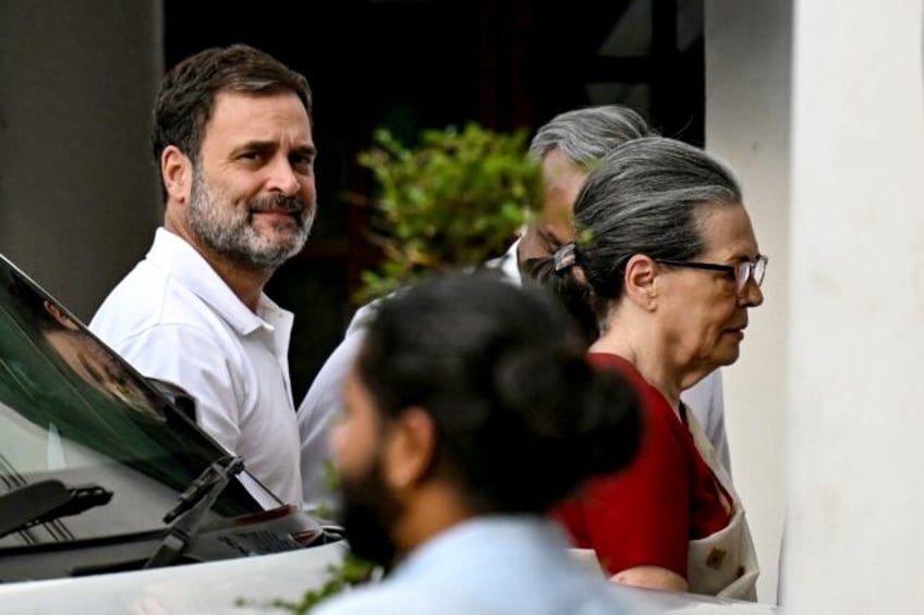 Rahul Gandhi (L) is the scion of a dynasty that dominated Indian politics for decades