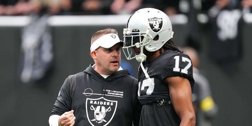 raiders coach tempers davante adams concerns after apparent injury i dont think it was crazy serious