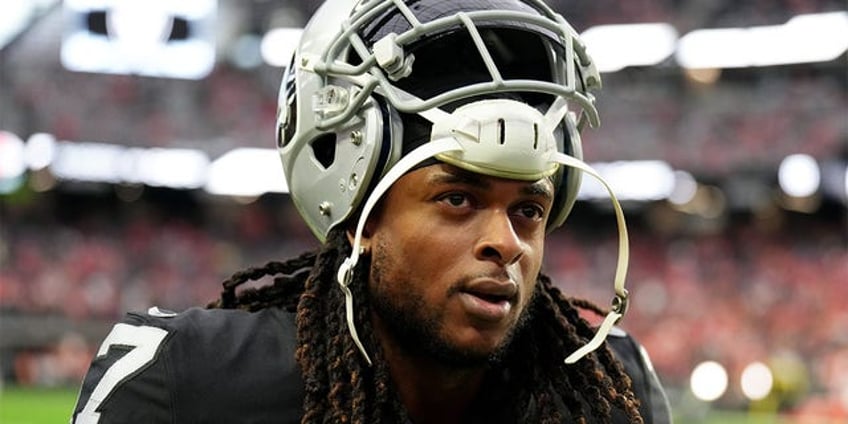 raiders coach tempers davante adams concerns after apparent injury i dont think it was crazy serious