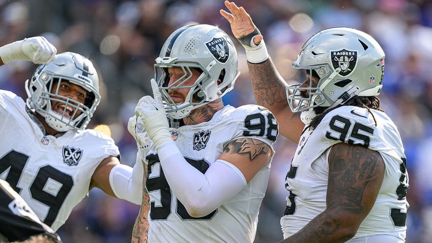 Maxx Crosby celebrates