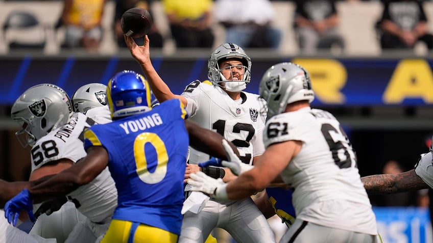 Aidan OConnell throws pass