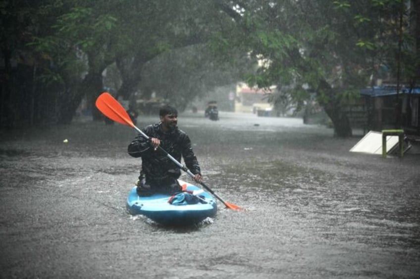 rains pound southern india ahead of cyclone