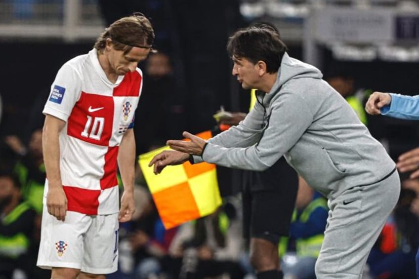 Luka Modric and Croatia coach Zlatko Dalic together during a match in Egypt in March