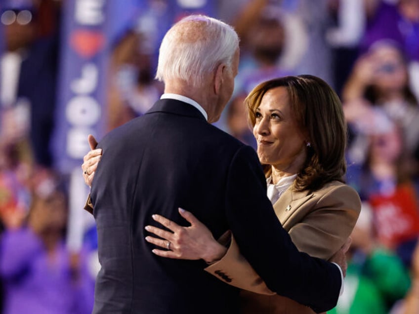 U.S. Vice President Kamala Harris and U.S. President Joe Biden greet each other at the end