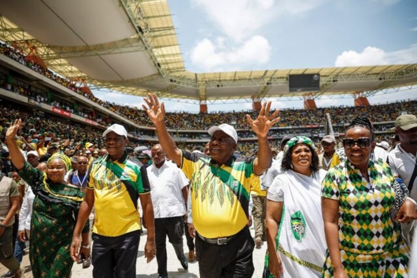 South African President Cyril Ramaphosa (C) rallies ruling ANC party supporters in Mbombela