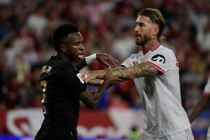 ramos sevilla hold leaders madrid in entertaining draw