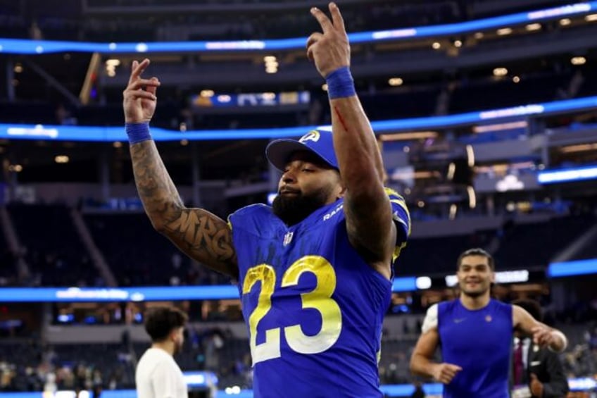 Kyren Williams and Puka Nacua of the Los Angeles Rams celebrate after defeating the New Orleans Saints