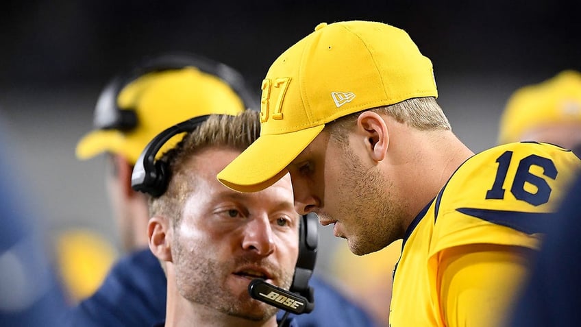 Jared Goff talks with coach Sean McVay