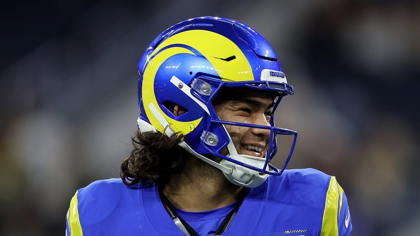 Puka Nacua smiles on field