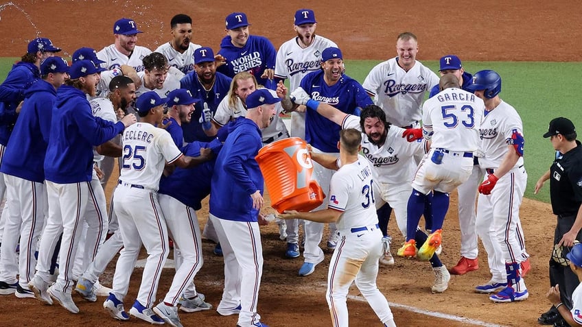 rangers adolis garcia blasts walk off home run in 11th to complete comeback in game 1 of world series