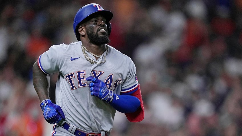 rangers astros involved in benches clearing brouhaha after adolis garcia grand slam