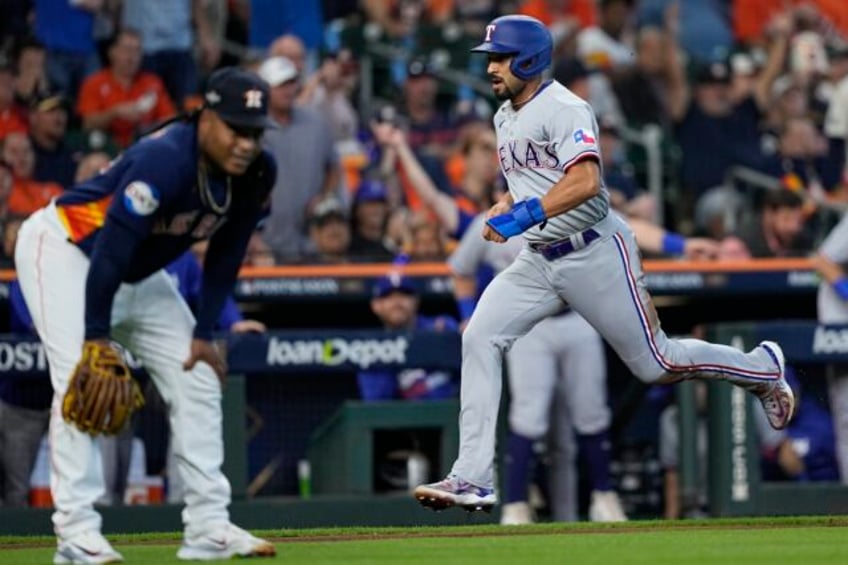 rangers build big early lead off valdez hold on for 5 4 win over astros to take 2 0 lead in alcs