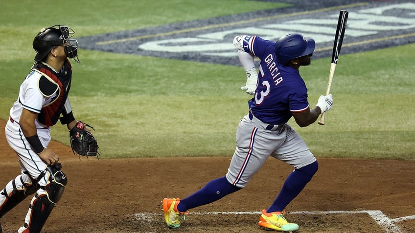 rangers hero adolis garcia out of world series game 4 lineup due to injury