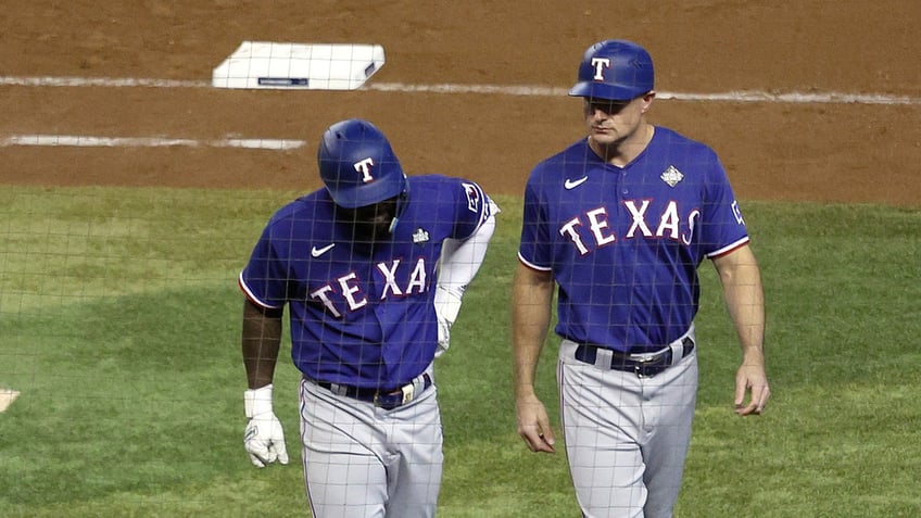 rangers hero adolis garcia out of world series game 4 lineup due to injury