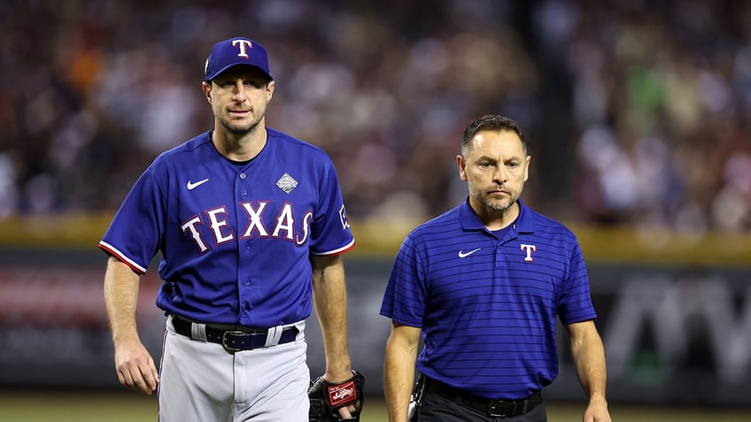 rangers max scherzer exits world series game 3 start with apparent back injury