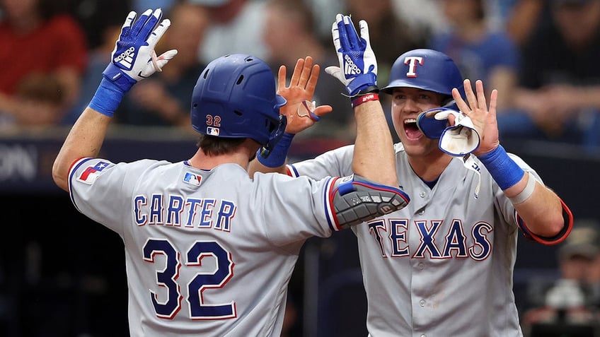 rangers powerhouse offense nathan eovaldis gem help clinch two game sweep of rays in al wild card series