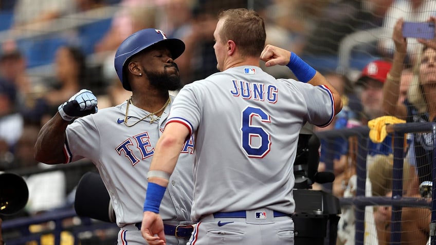 rangers powerhouse offense nathan eovaldis gem help clinch two game sweep of rays in al wild card series