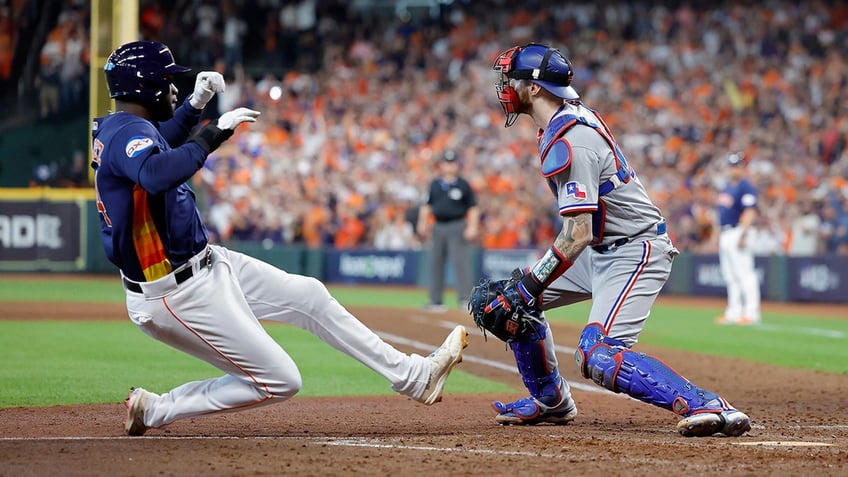 rangers push postseason win streak to 7 games with alcs game 2 victory over astros