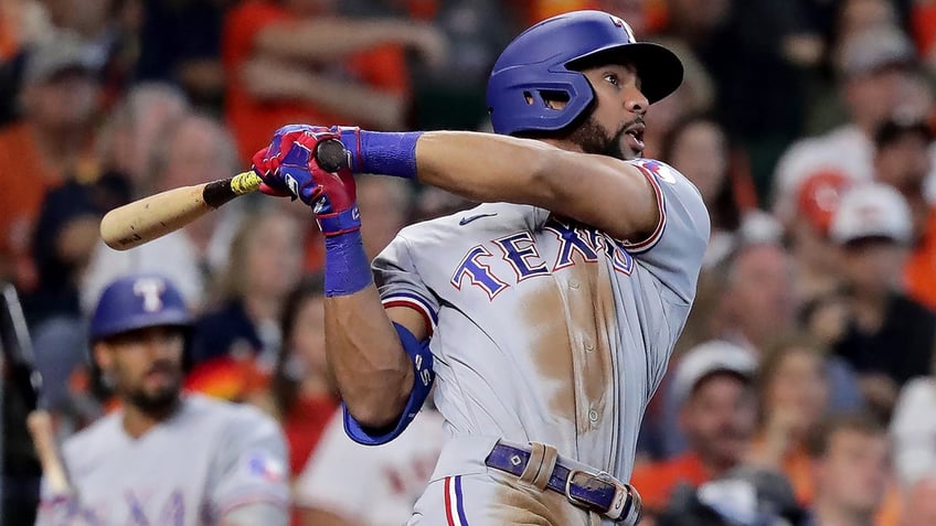 rangers push postseason win streak to 7 games with alcs game 2 victory over astros