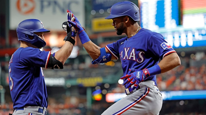 rangers rally behind jordan montgomerys brilliant start to win alcs game 1 over astros