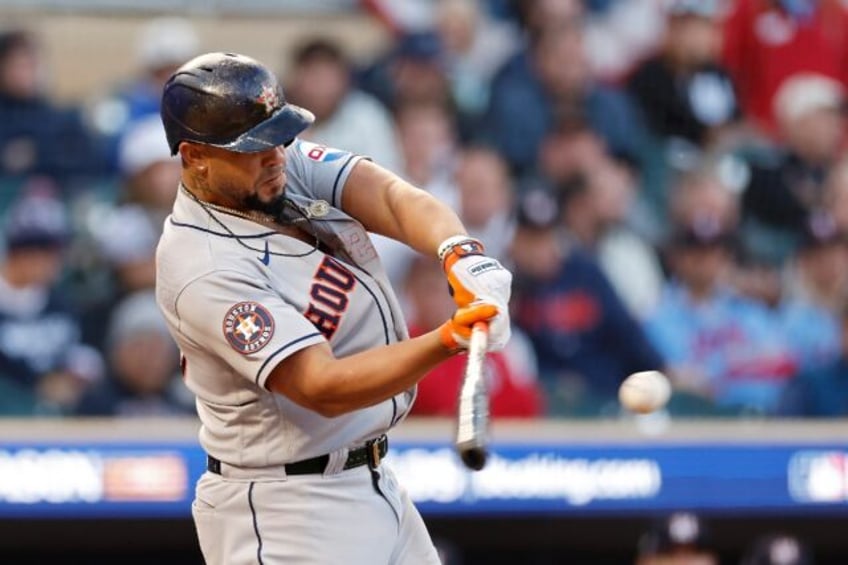 rangers sweep orioles to advance astros rout twins